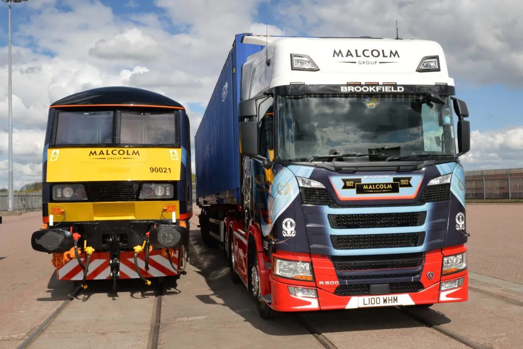 The Donald Malcolm electric locomotive and the Billy Stirling cab onsite at MIRP. Photo credit: The Malcolm Group